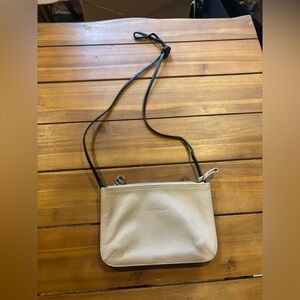 Cream and black leather longchamp crossbody bag